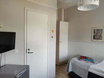 Фото номера Стандартный одноместный номер Отель Hotel Vuolake г. Лаукаа 6