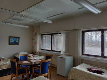 Фото номера Стандартный четырехместный номер Отель Hotel Vuolake г. Лаукаа 2