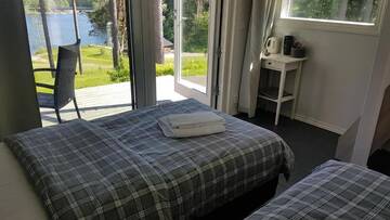 Фото номера Стандартный одноместный номер Отели типа «постель и завтрак» Varjola Holiday Center г. Лаукаа 21